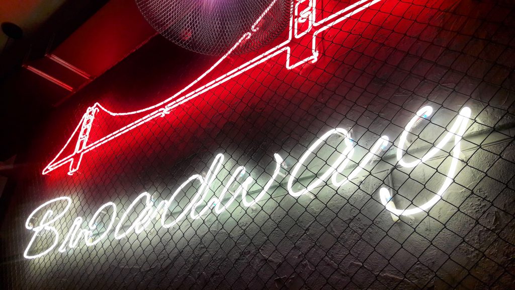 Neon light in the Broadway restaurant at Shymkent's Arbat at night.