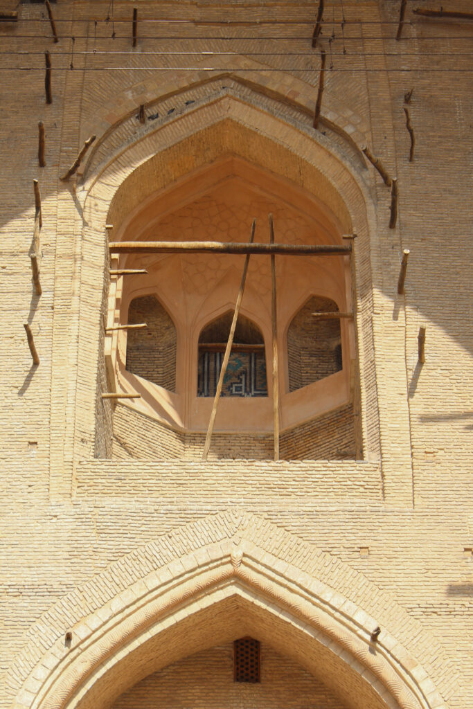 Info Shymkent - Remaining scaffolding at the unfinished front of the Yasawi Mausoleum in Turkistan