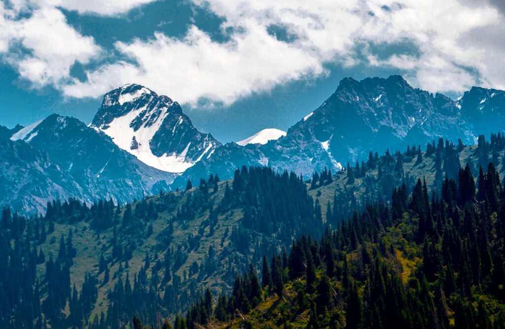 Info Shymkent - Snow capped mountains of Ile Alatau mountains in Kazakhstan by photographer Zhambay