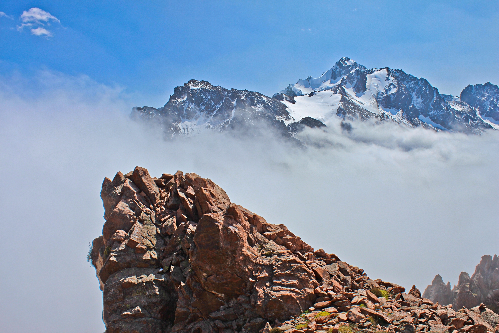 Info Shymkent - View from Peak Shymbulak to Peak Komsomol in Transili-Alatau in Kazakhstan