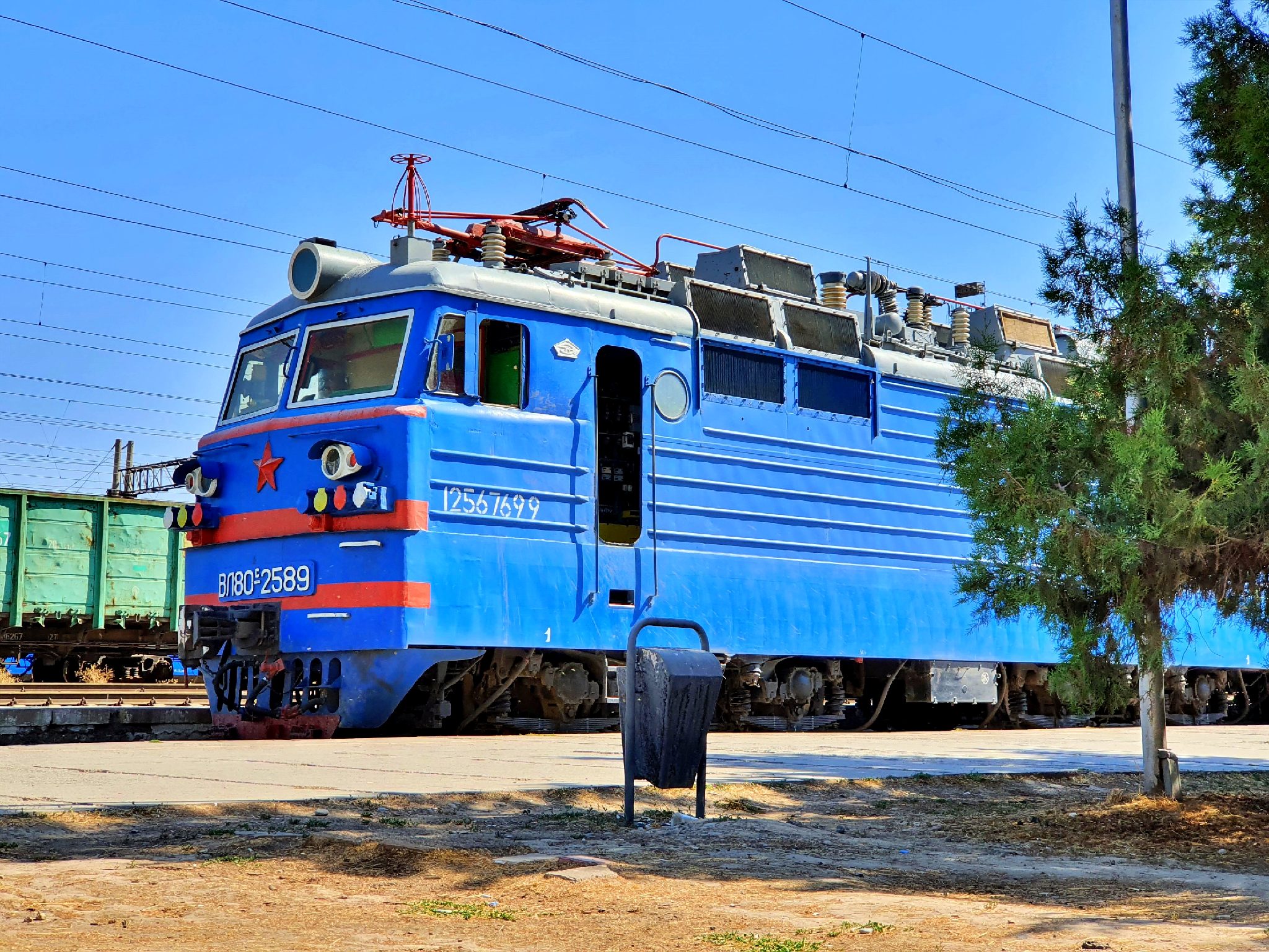 Info Shymkent - VL80-S a electric locomotive in train station Shymkent in Kazakhstan