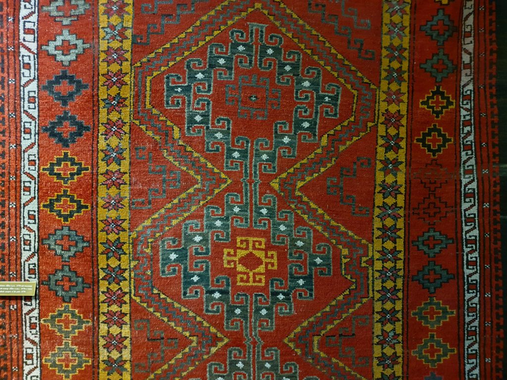 Info Shymkent - Kazakh carpet with ornaments at the History Museum in Shymkent