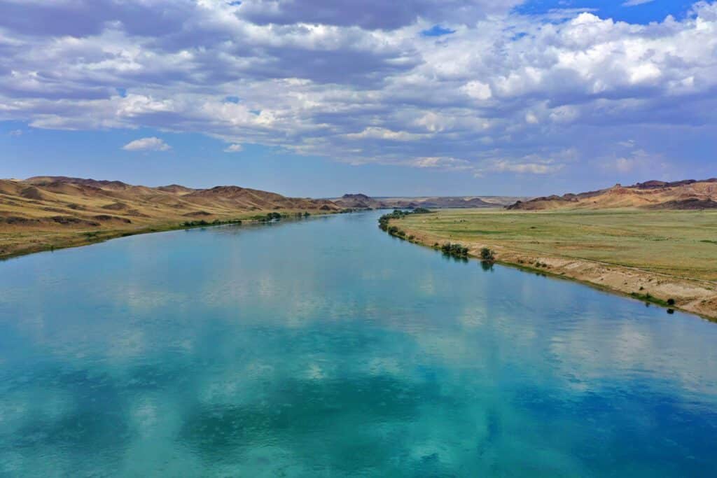 Info Shymkent - View over the cyan blue Ili river near Tamgaly Tas
