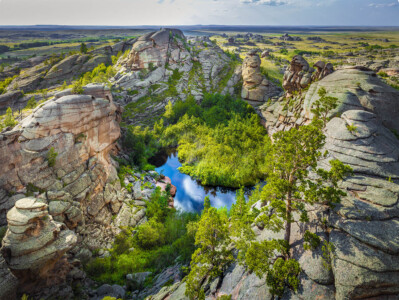 Lake at Bayanaul National Park Info Shymkent - Beautiful lake in the crazy landscape of Bayanaul National Park in Kazakhstan (Image: Farhat Kabdykairov)